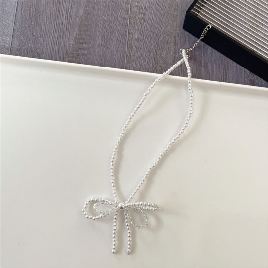 Handgemaakte boog sieraden parel choker ketting