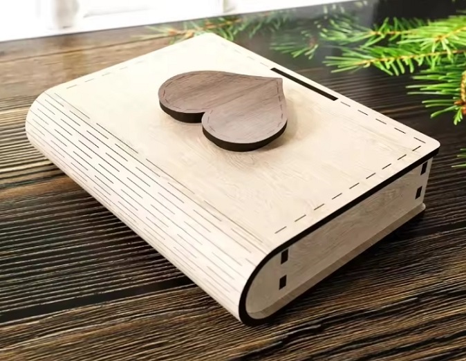 Scatola regalo in legno a forma di libro con lucchetto e biglietto tagliato al laser Scatola regalo in legno a forma di libro con lucchetto e biglietto tagliato al laser