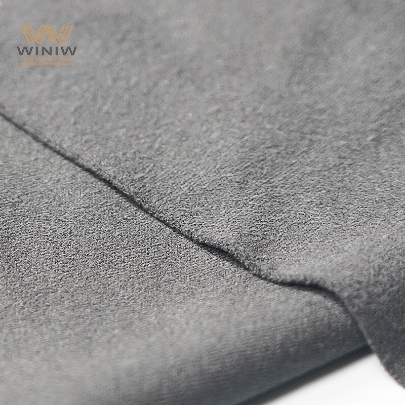 Pelle sintetica scamosciata morbida per tomaie di scarpe alla moda.