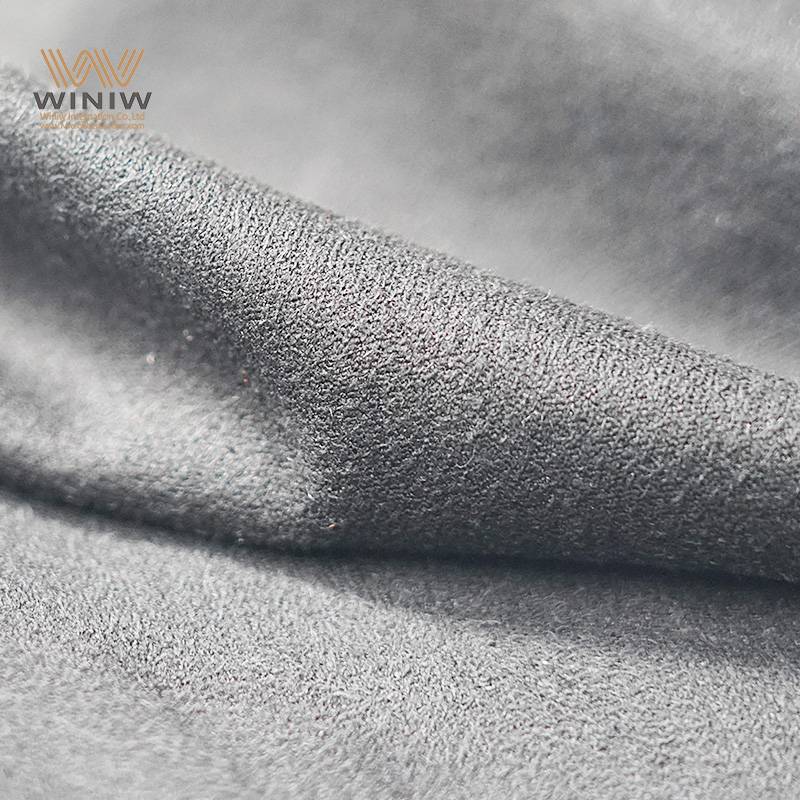 Pelle sintetica scamosciata morbida per tomaie di scarpe alla moda.