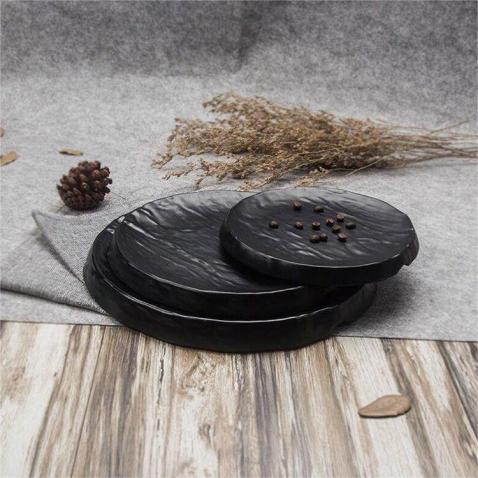 Elegante vajilla occidental de melamina en blanco y negro