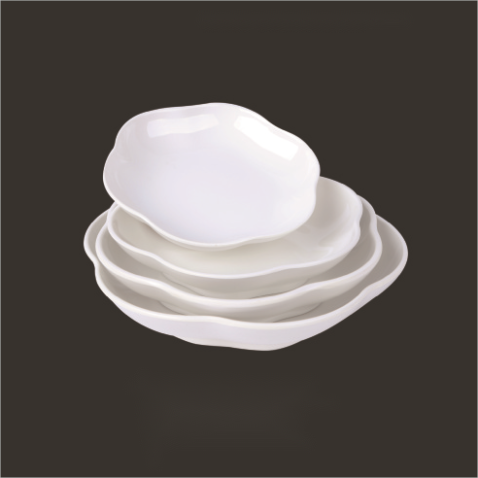 Colección de utensilios de cocina de melamina blanca