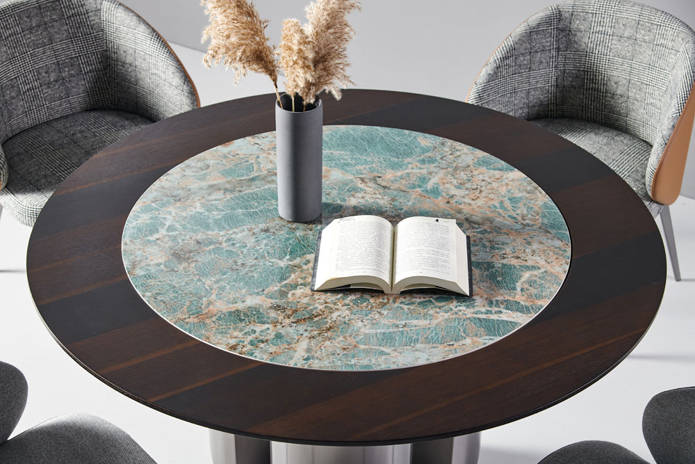 Swivel ceramic top dining table