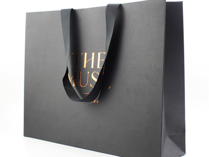 2025 new style custom full black printed paper shopping bags for clothing retail stores.
