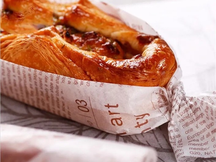 Customized soy bean ink printed greaseproof paper is eco-friendly for cakery and bakery?