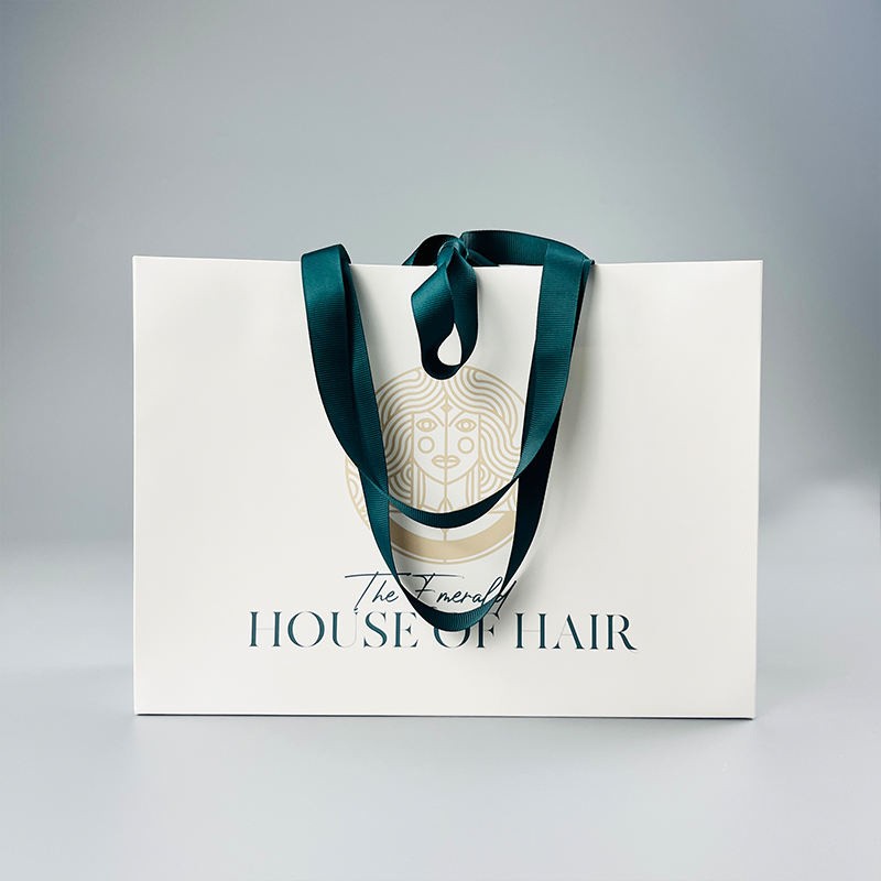 Qual è il modo migliore per confezionare le parrucche? In lussuose buste di carta o in altro modo?