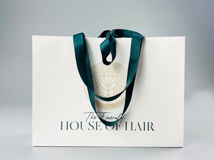 ¿Cuál es la mejor manera de empaquetar las pelucas? ¿Bolsas de papel de lujo o algo más?