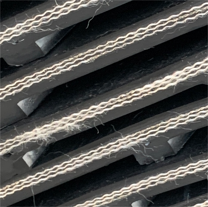 Do you know anything about patterned conveyor belts?