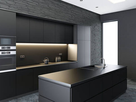 Plans de travail en pierre frittée noire : pourquoi remplacent-ils le granit dans les cuisines modernes ?