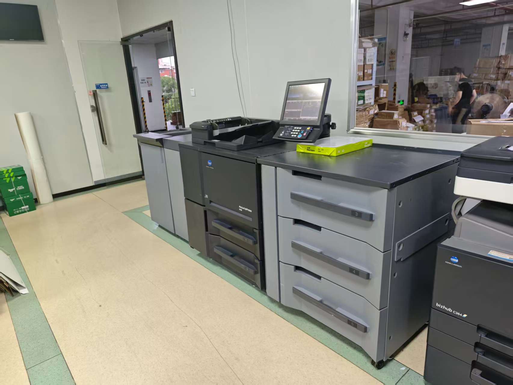 Why do we purchase an additional new Konica Minolta press when we already have a Heidelberg press?