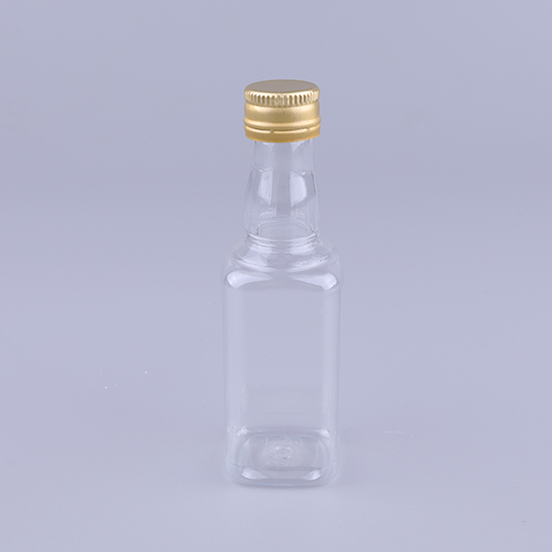 Mini Alcoholic Drink Liquor 50ml Empty Whiskey Plastic Bottle Portable Small Bottles With Gold Silver Caps