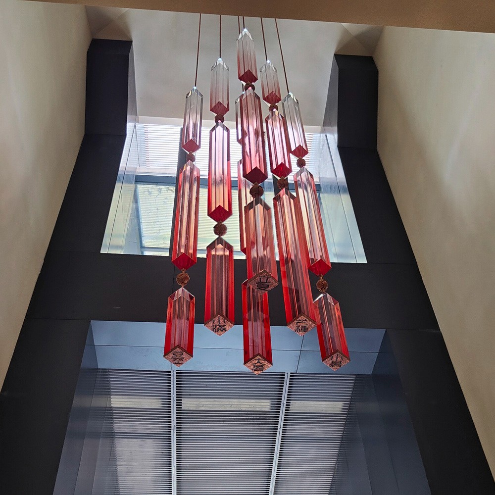 The designer designs a simple chandelier The designer designs a simple chandelier