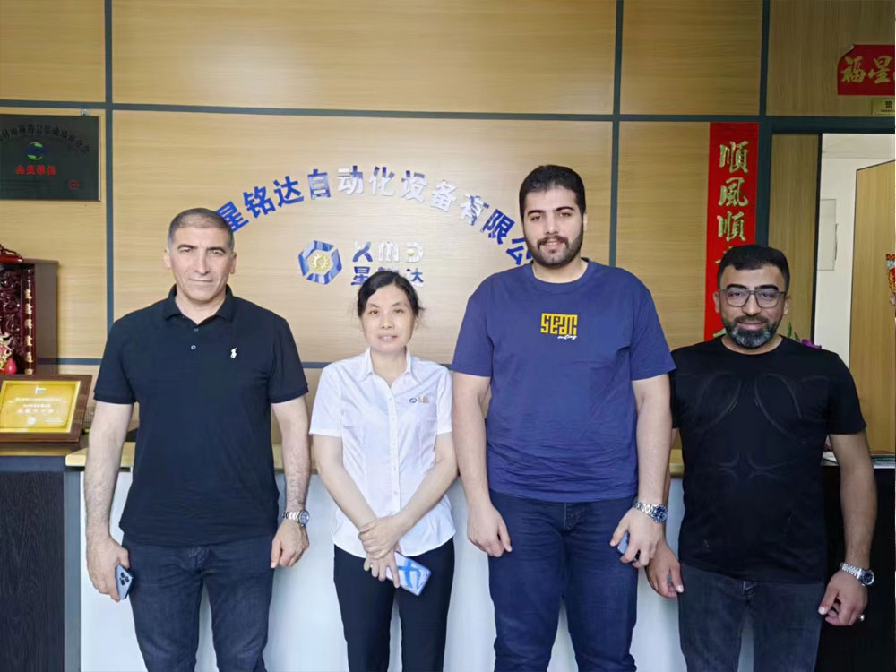 Iraqi customers come to visit the factory