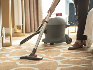 How do I maintain my home vacuum cleaner?