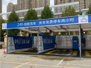 How can a 24-hour, unmanned, fully automated car wash machine address the challenges of manual cleaning?