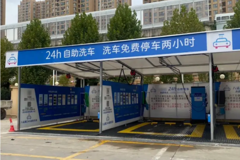 How can a 24-hour, unmanned, fully automated car wash machine address the challenges of manual cleaning?