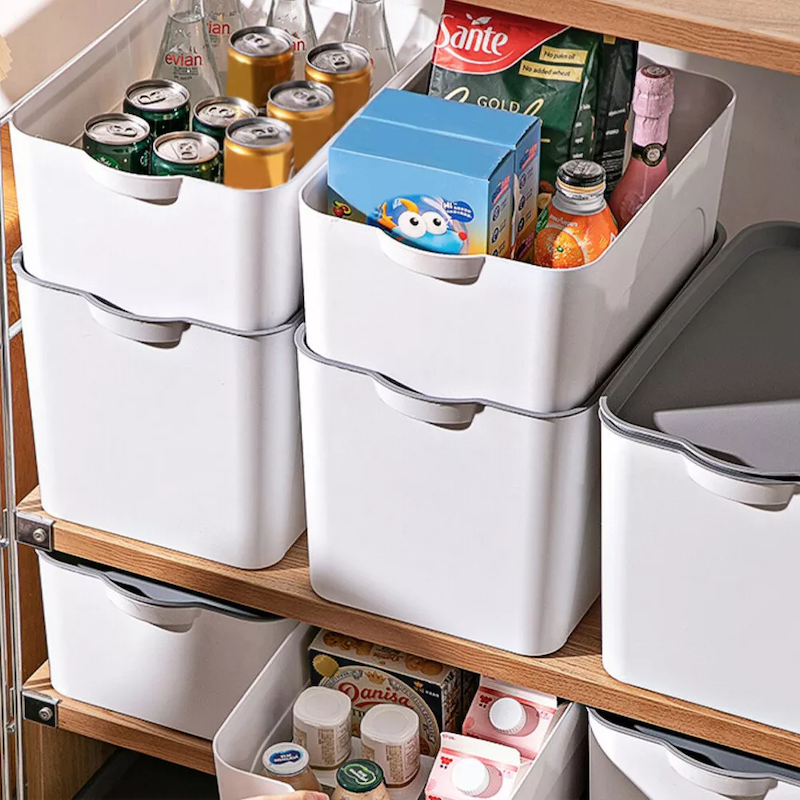 Which is better for kitchen use, plastic storage boxes or rolling storage carts?