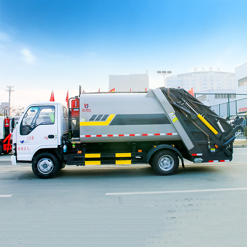 Исузу 4X2 7 кубических метров прессованный мусоровоз