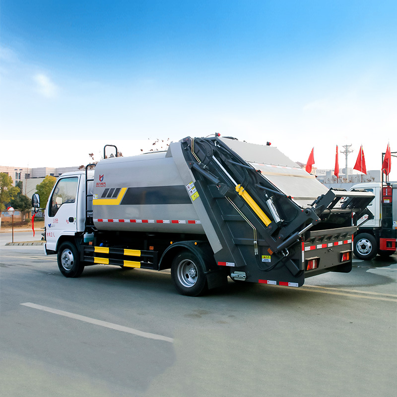 Исузу 4X2 7 кубических метров прессованный мусоровоз