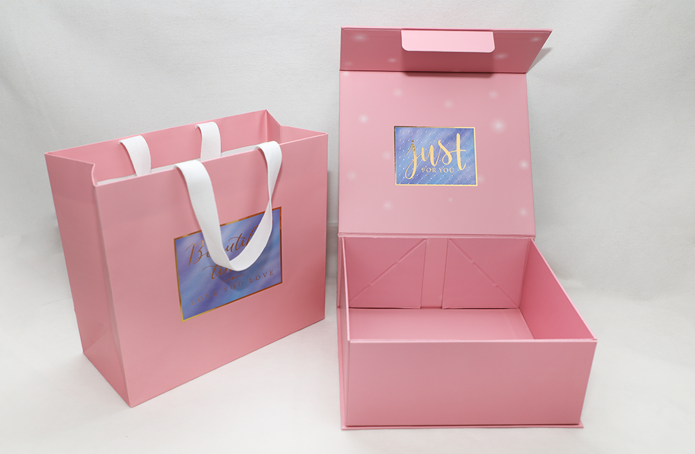 white gift bag with ribbon