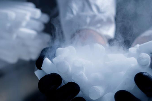 What industrial materials can dry ice clean?