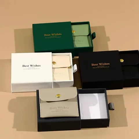 Joyeros de lujo con cajones y bolsas de cuero