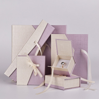 slight purpule jewelry packaging paper box with ribbon