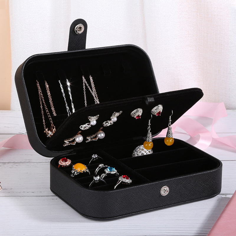 travel jewelry holder with multiple storage divisions