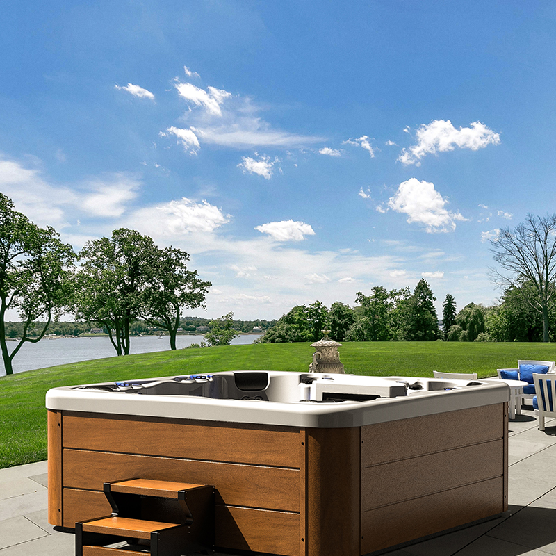 How far away should the outdoor spa jacuzzi tub be from the house?