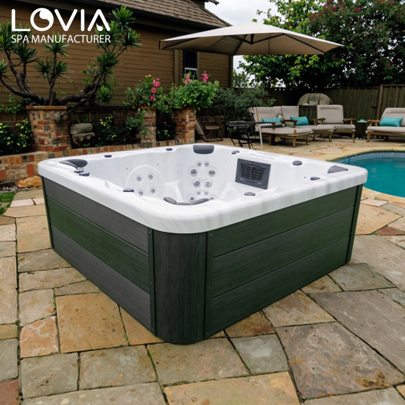 How do you adjust the water temperature of an outdoor spa hot tub?