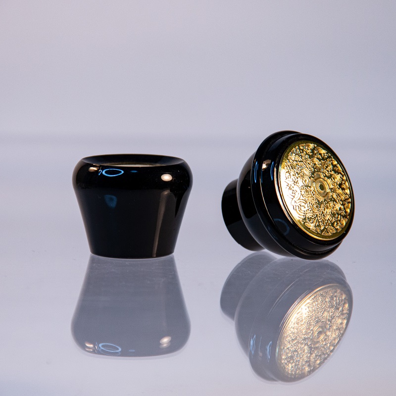 black perfume bottle lid