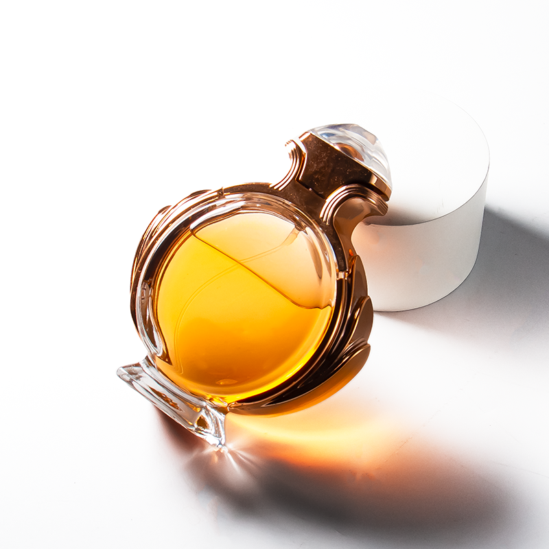 Luxury Perfume Bottle Set 85ml Unique Round Glass Bottle with Pump Sprayer and Box Packaging