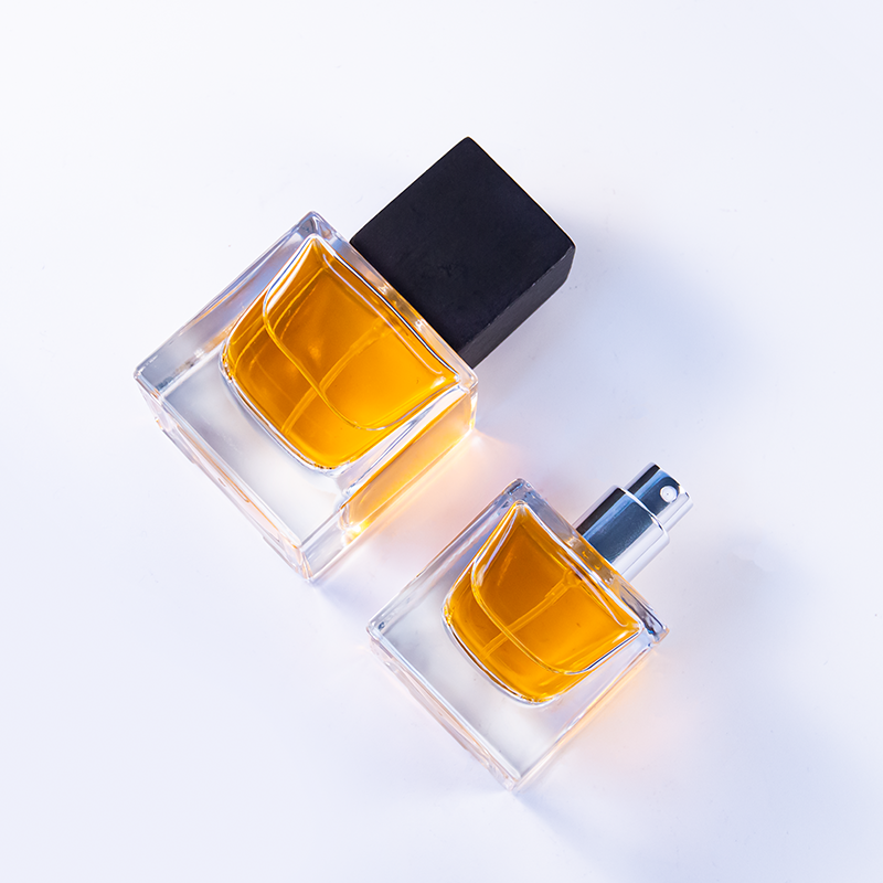 Stock Thick Clear Empty Glass Bottle 30ml 50ml 100ml Perfume Cologne Bottle with Black Cap