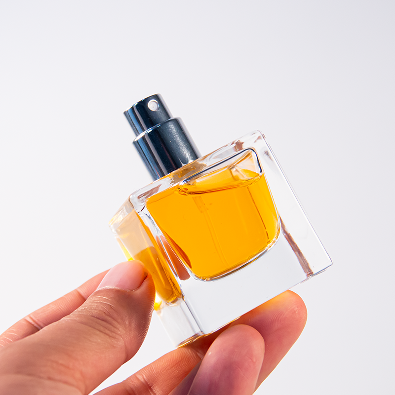 Stock Thick Clear Empty Glass Bottle 30ml 50ml 100ml Perfume Cologne Bottle with Black Cap