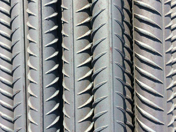 What role do transverse ribbed steel bars play in construction?