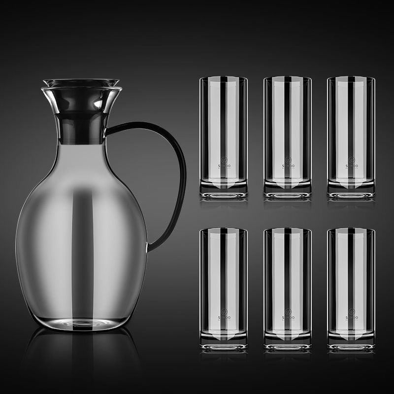 white glass pitcher with lid