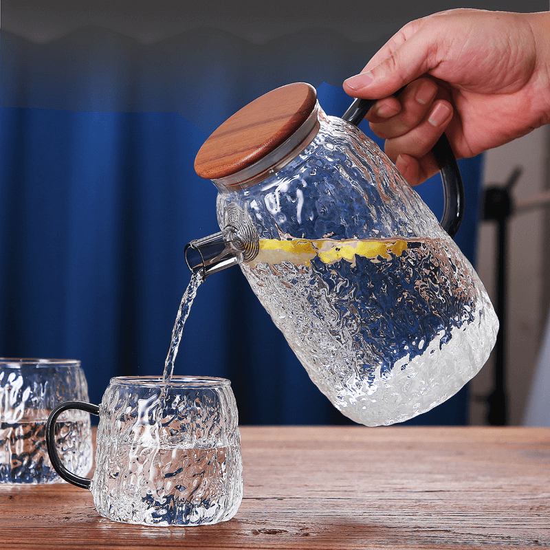 glass water carafe with wooden lid