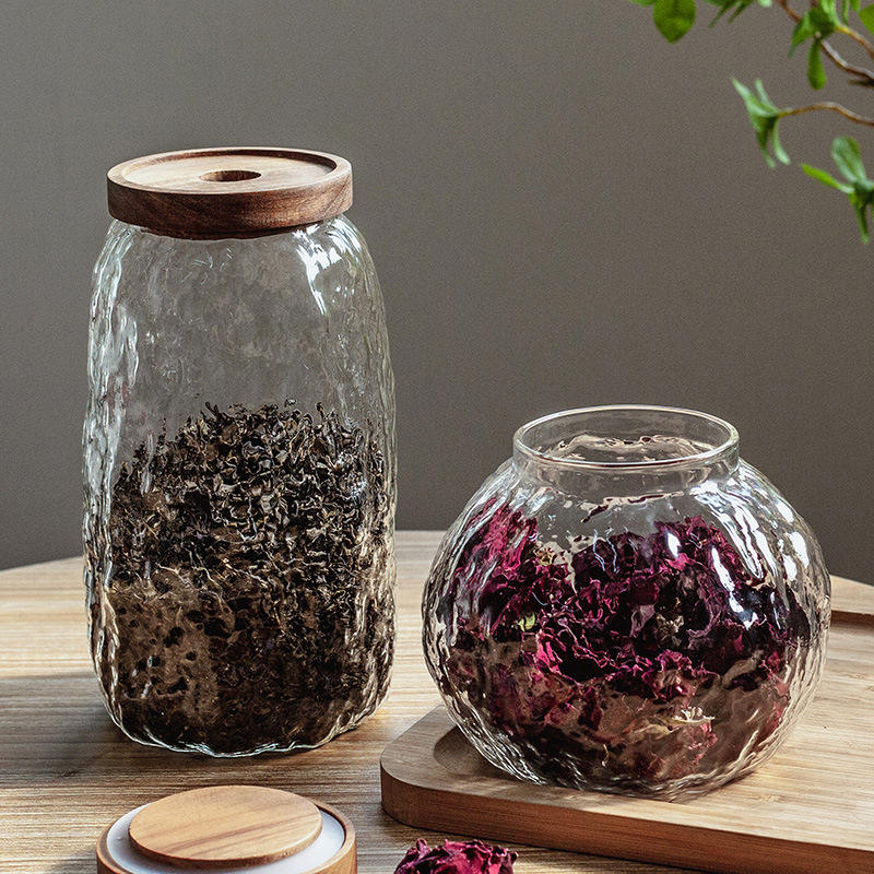 glass containers with wooden lids