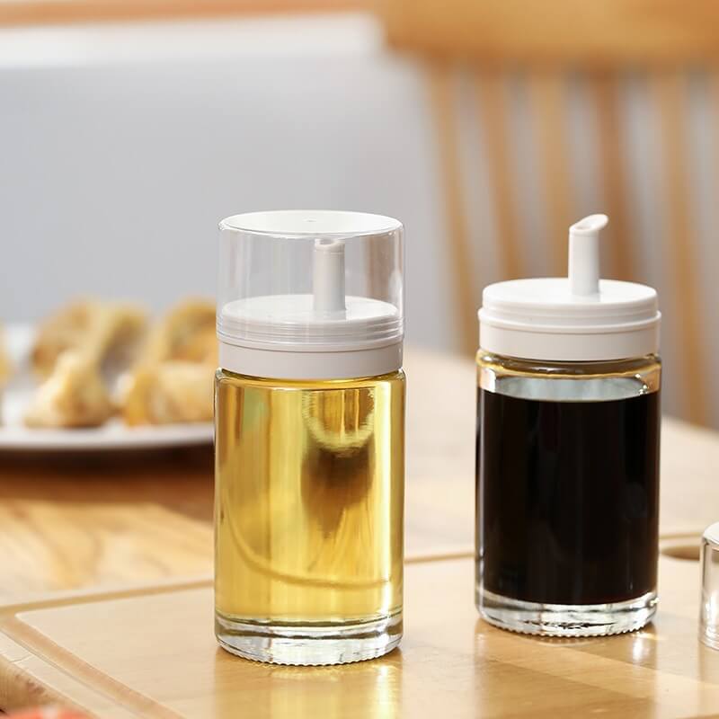 round olive oil and vinegar glass bottle 100ml olive oil dispenser with plastic cap no drip pourer spout