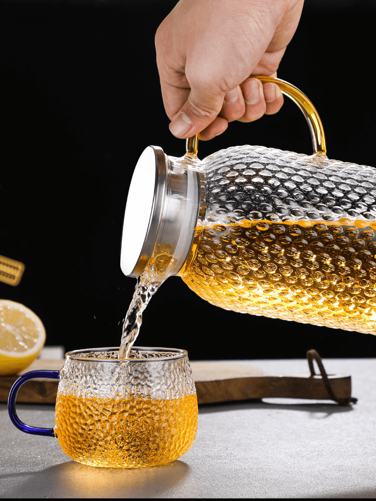 large glass water pitcher with spout