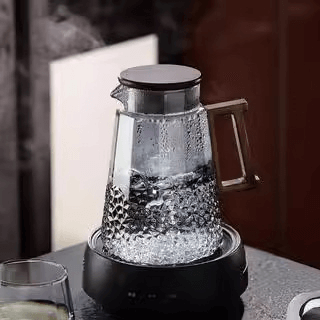 vintage jug with wooden handle vintage jug with wooden handle