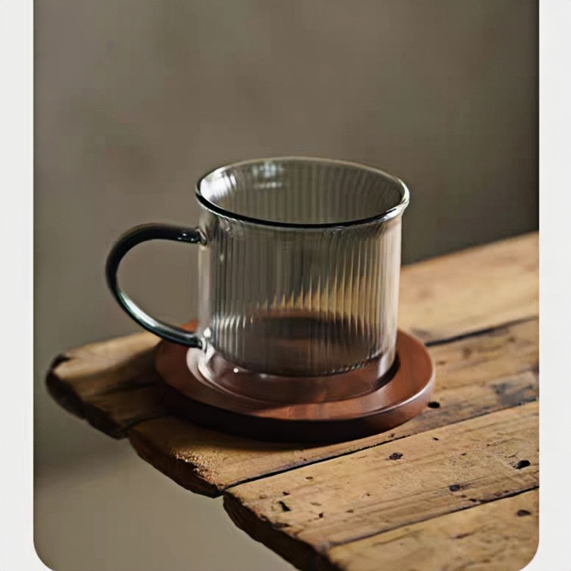 drinking glass with wooden stand