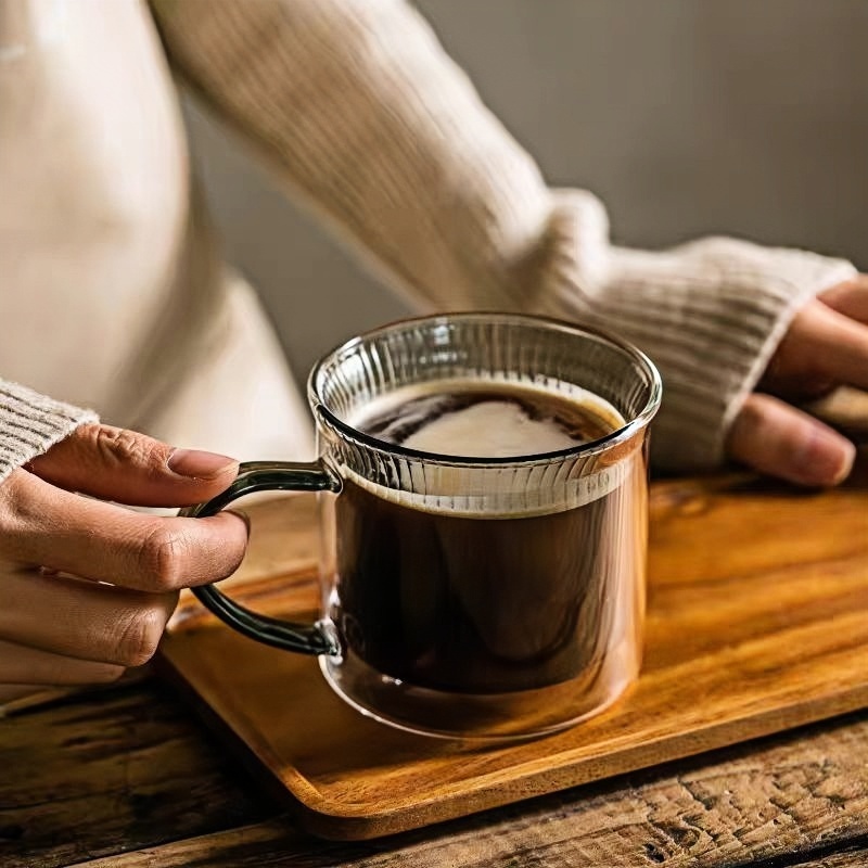 Grey coffee drinking mug with handle