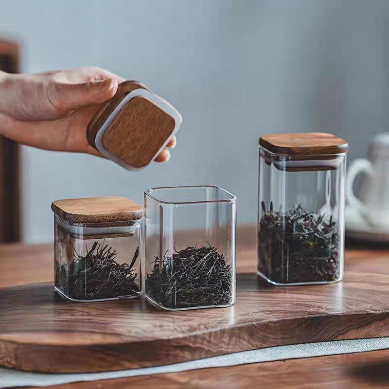 glass storage canister with wood lid
