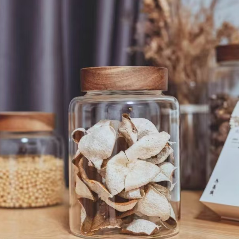 Giant glass pantry jar with screw wood top lid