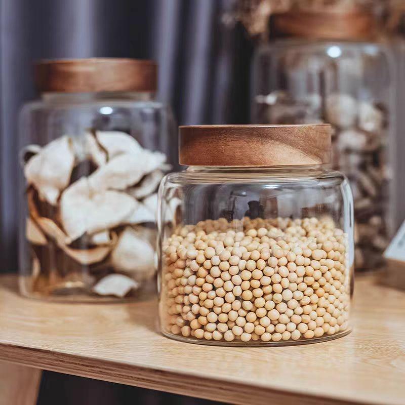 Giant glass pantry jar with screw wood top lid