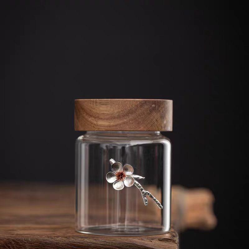 Clear sealed glass kitchen storage bottles with acacia lid