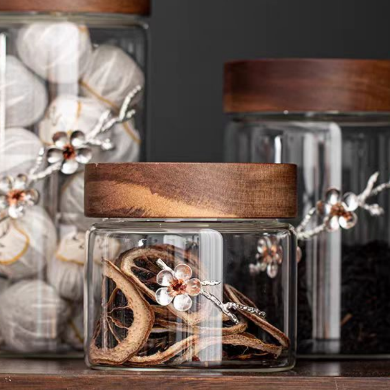 Clear sealed glass kitchen storage bottles with acacia lid