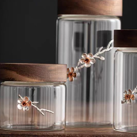 Clear sealed glass kitchen storage bottles with acacia lid