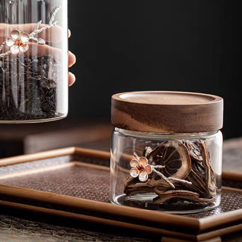 Clear sealed glass kitchen storage bottles with acacia lid